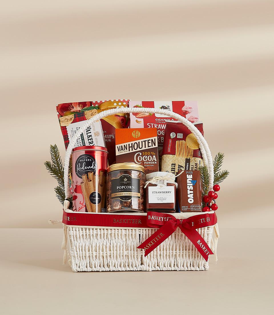 A gift basket containing indulgent food items, perfect for gifting or enjoying yourself.