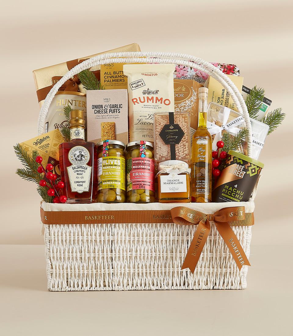 A festive gift basket filled with international delicacies, perfect for the holiday season.