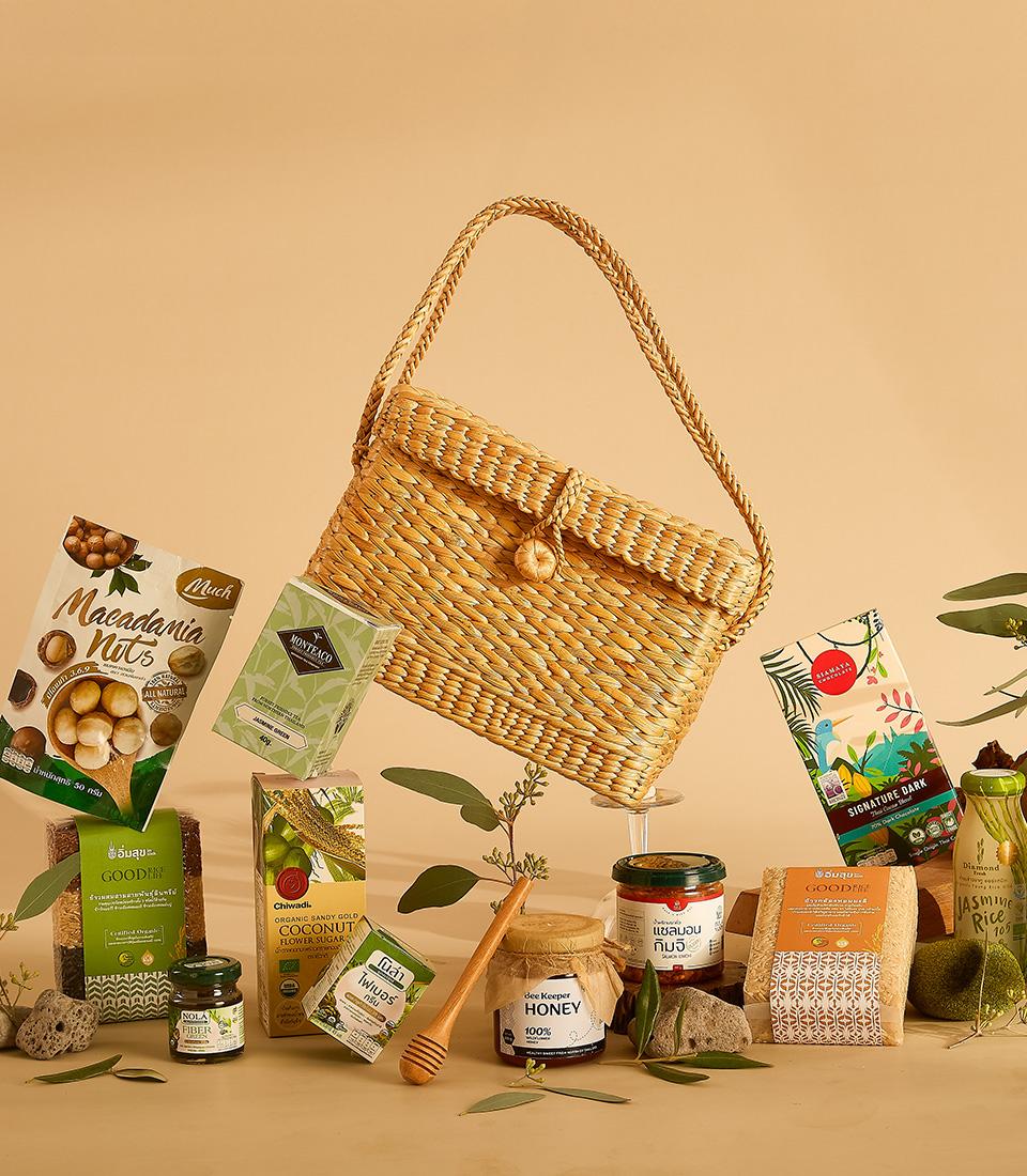 A gift basket with snacks and beverages.