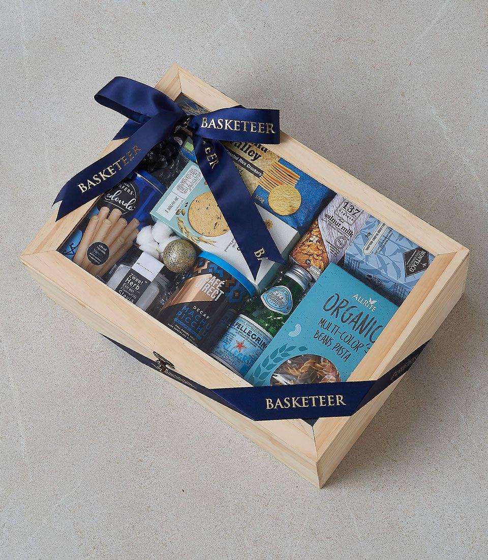 A gift basket with assorted snacks and beverages