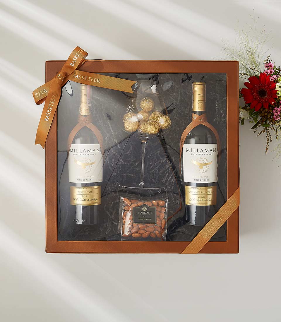 Millaman Limited Reserve wine gift box with a crystal wine glass, almonds, and truffles.