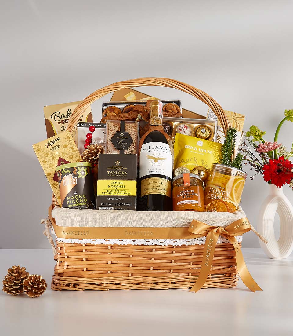 A luxurious gift basket overflowing with festive goodies, perfect for any occasion.