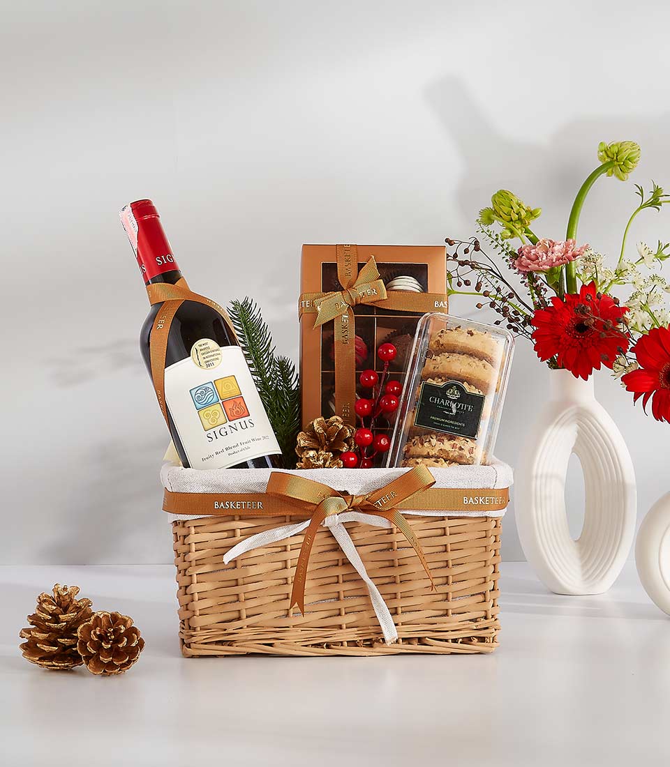 A wicker basket overflowing with festive goodies, perfect for any occasion.