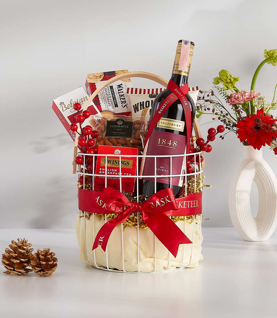 A white wicker basket overflowing with festive goodies, perfect for any occasion.