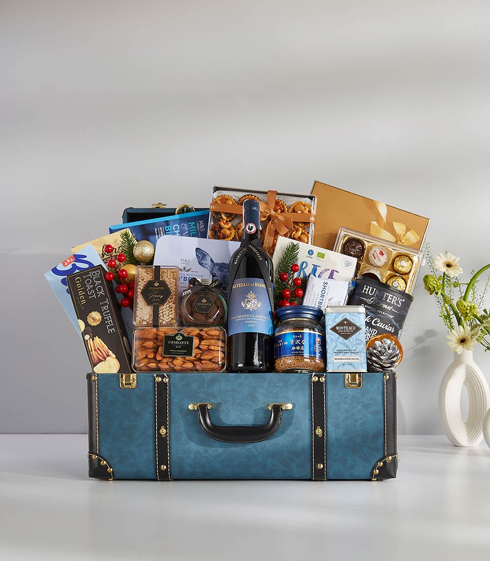 This elegant gift basket is filled with a variety of gourmet treats and beverages, including champagne