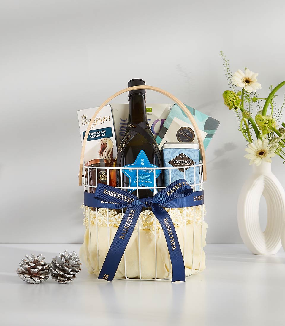 A white wicker basket overflowing with festive goodies, perfect for any occasion.