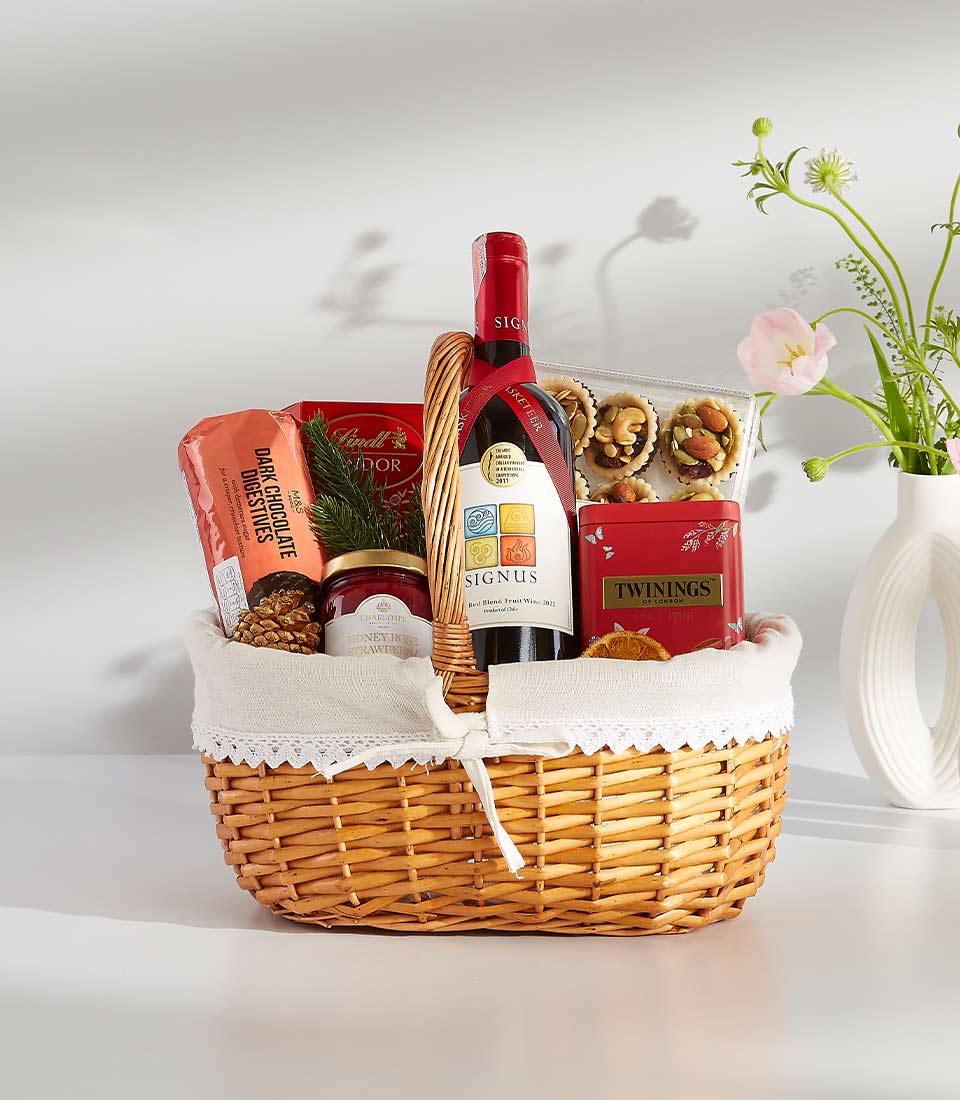 A festive gift basket overflowing with delicious treats, perfect for any occasion.
