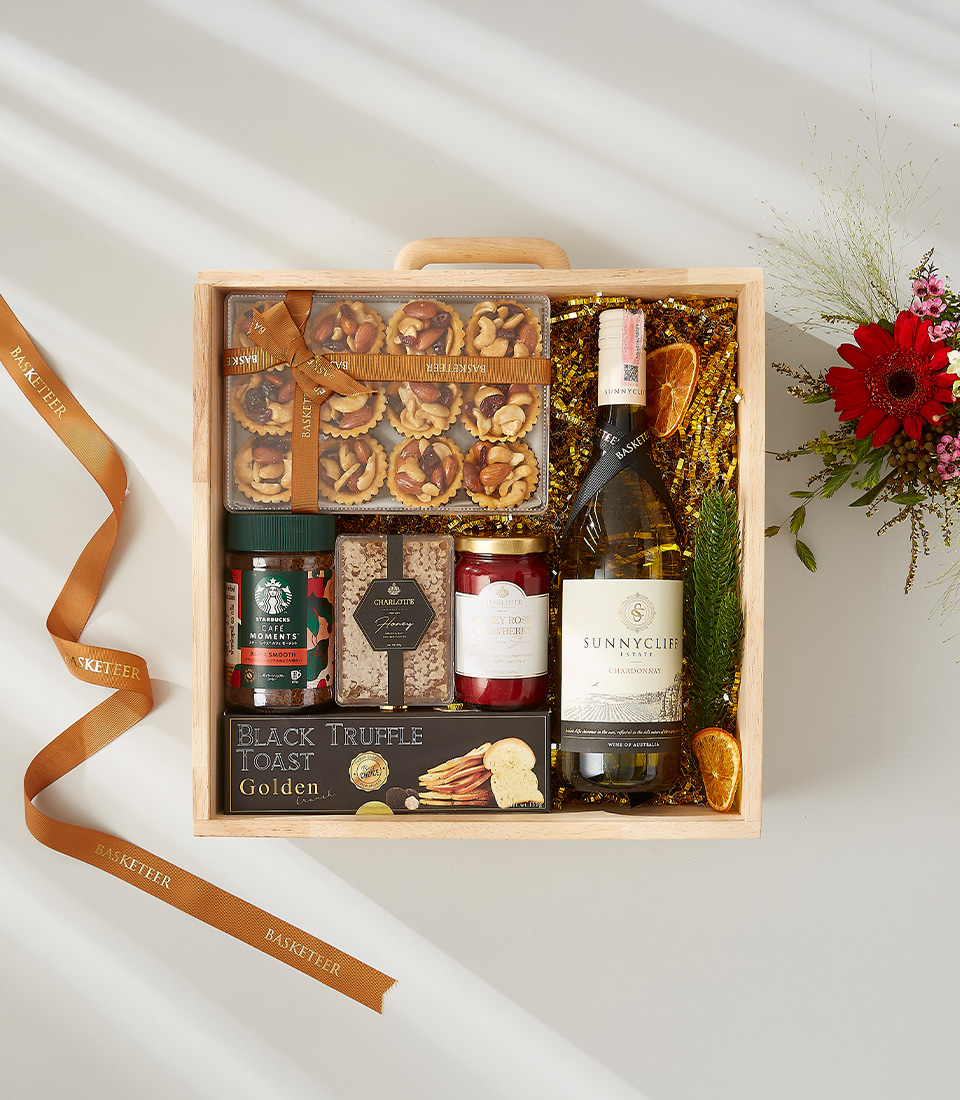 Sunnycliff Chardonnay wine gift box with nut tarts, truffle toast, honey, and raspberry jam.