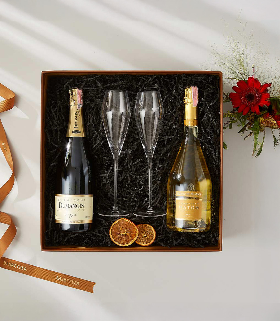 Luxury champagne gift box with Dumangin and Haton champagnes and two crystal flutes.