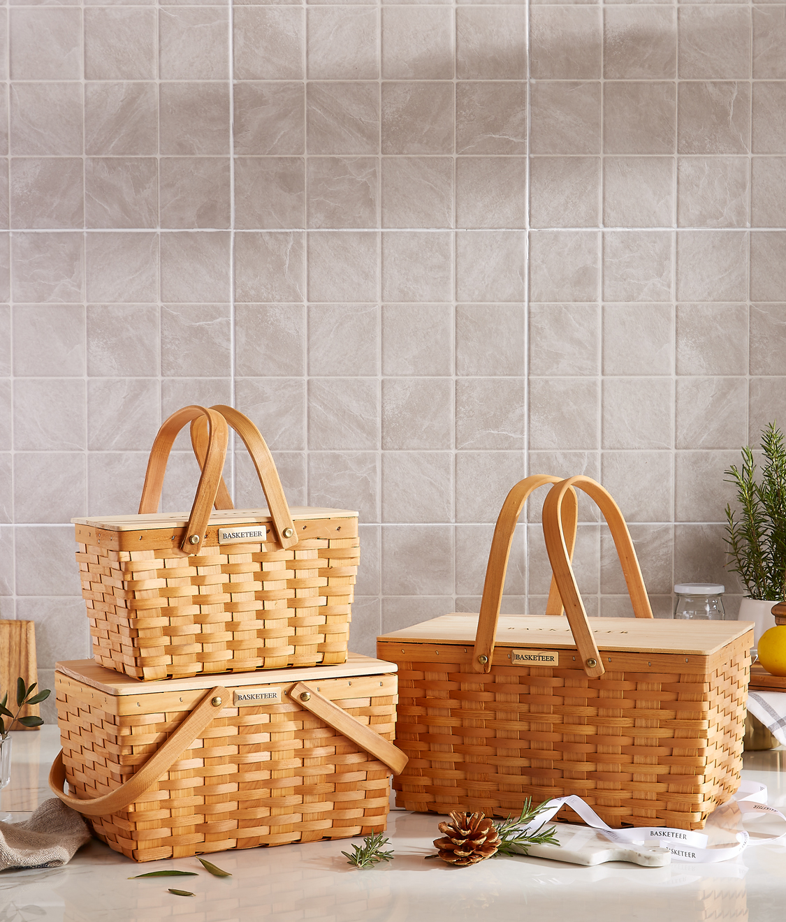 Elegant wooden baskets with handles, showcasing a rustic yet sophisticated design, perfect for gift hampers or home decor