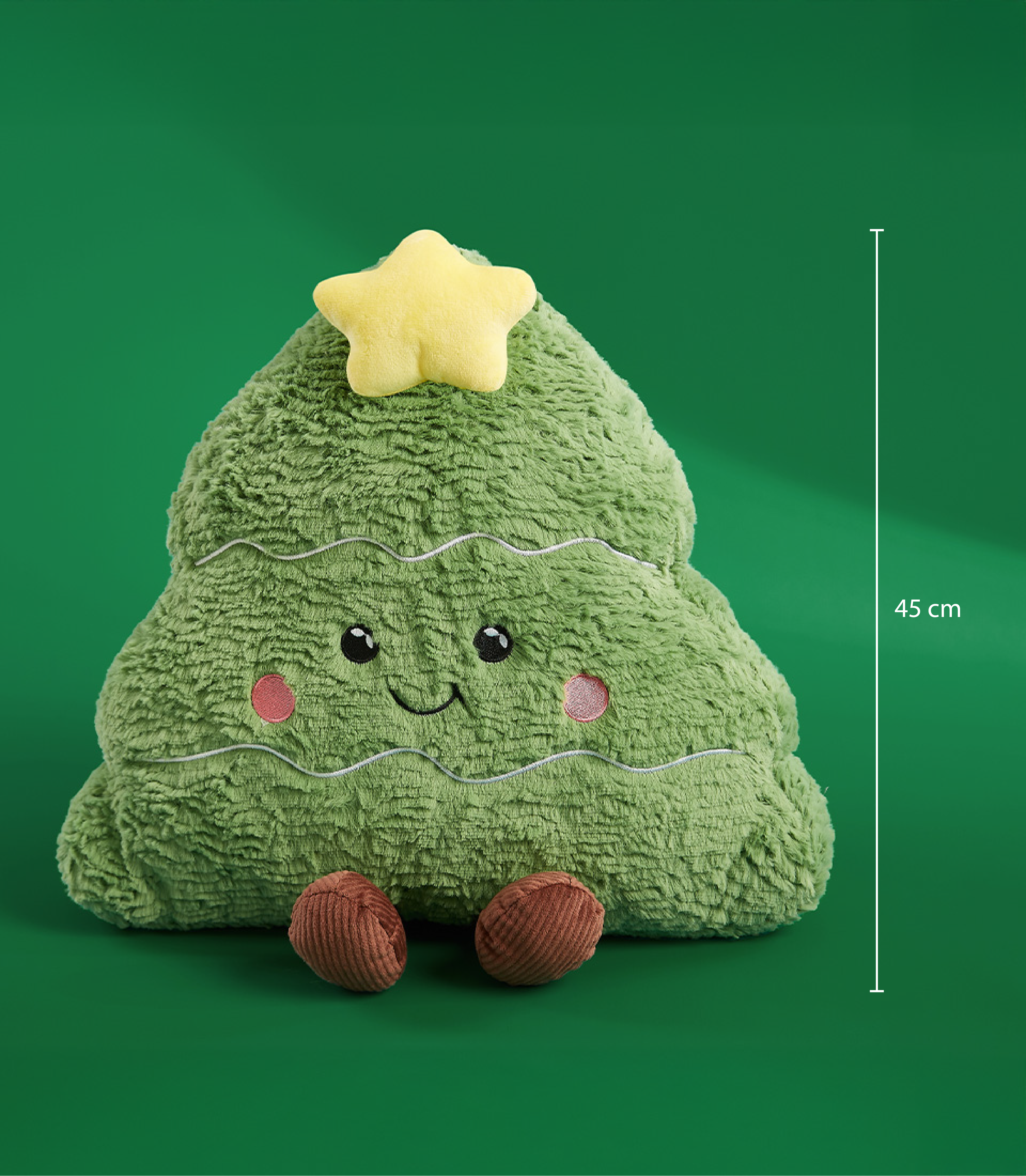 Green Christmas tree plush toy with a yellow star topper and a smiling face, measuring 45cm tall, on a green background.