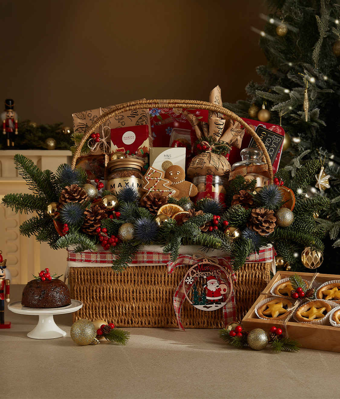 Luxurious Christmas gift basket filled with gourmet treats, chocolates, festive decorations, and holiday-themed ornaments.