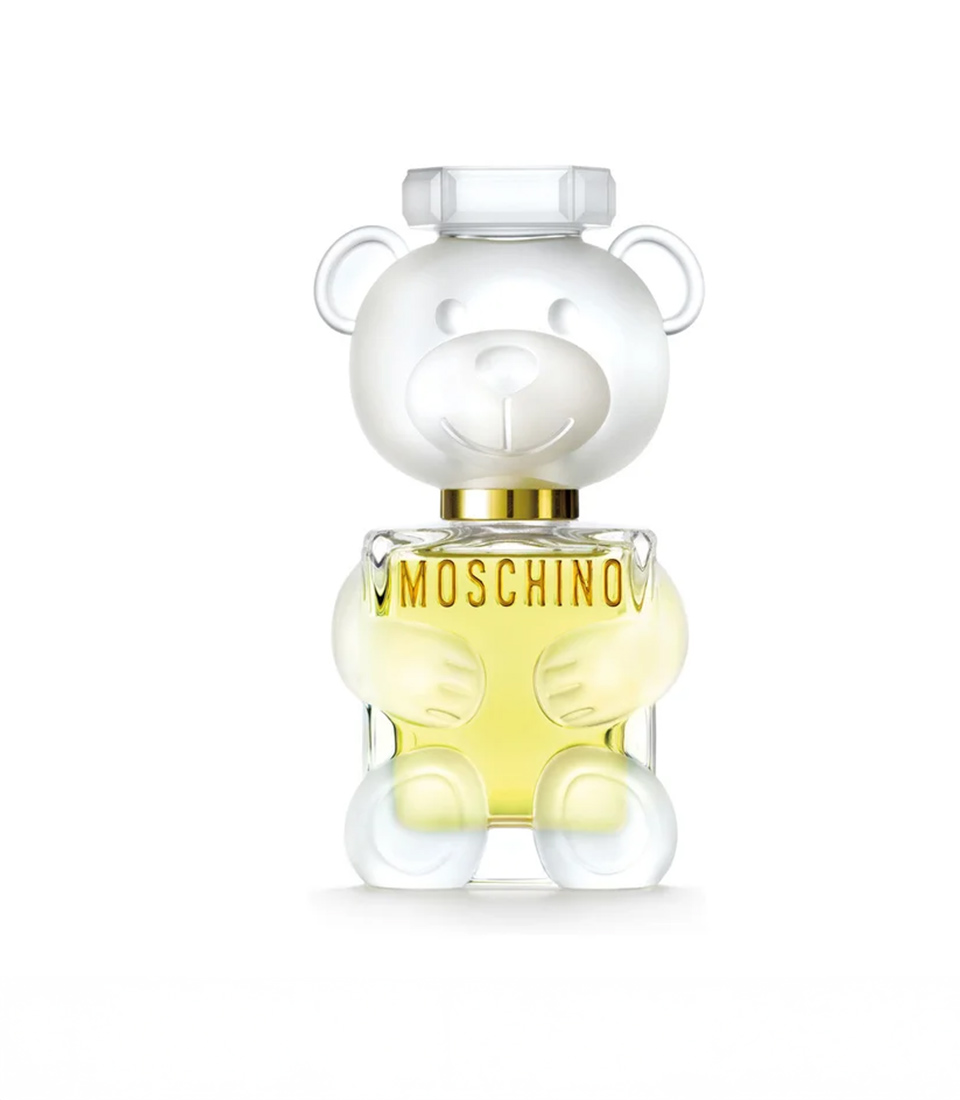 Moschino Toy 2 Eau de Parfum 100ml bottle shaped like a frosted glass teddy bear, alongside its white and gold packaging.