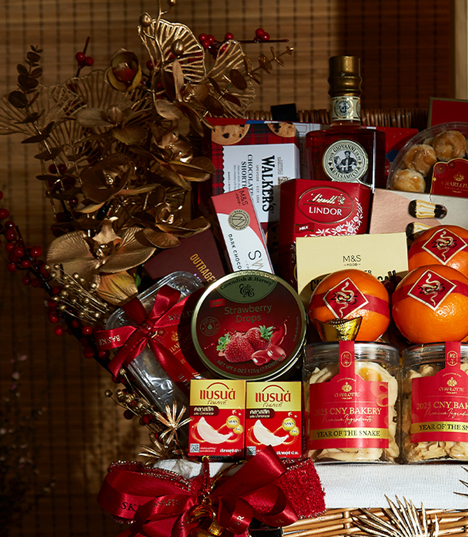 Premium Lunar New Year Celebration Basket with fresh oranges, fine teas, gourmet snacks, and festive treats.