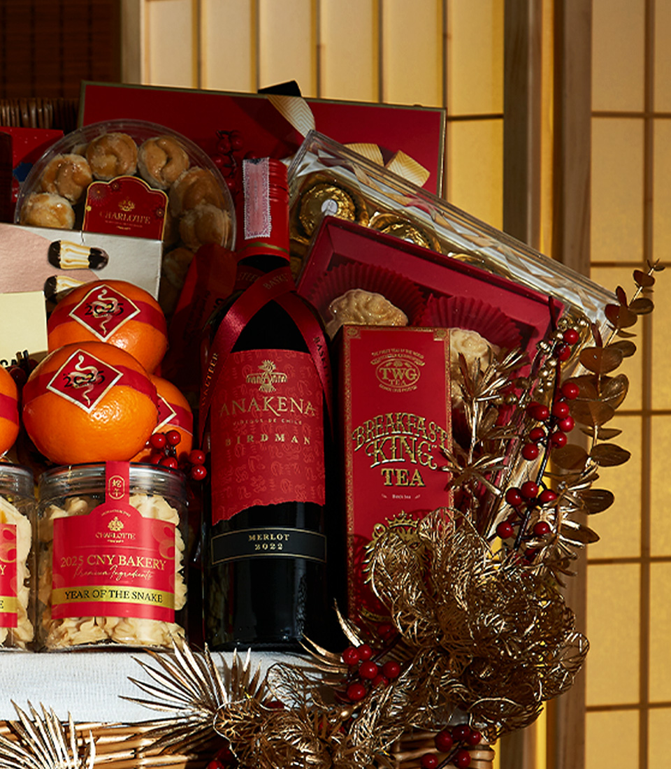 Premium Lunar New Year Celebration Basket with fresh oranges, fine teas, gourmet snacks, and festive treats.