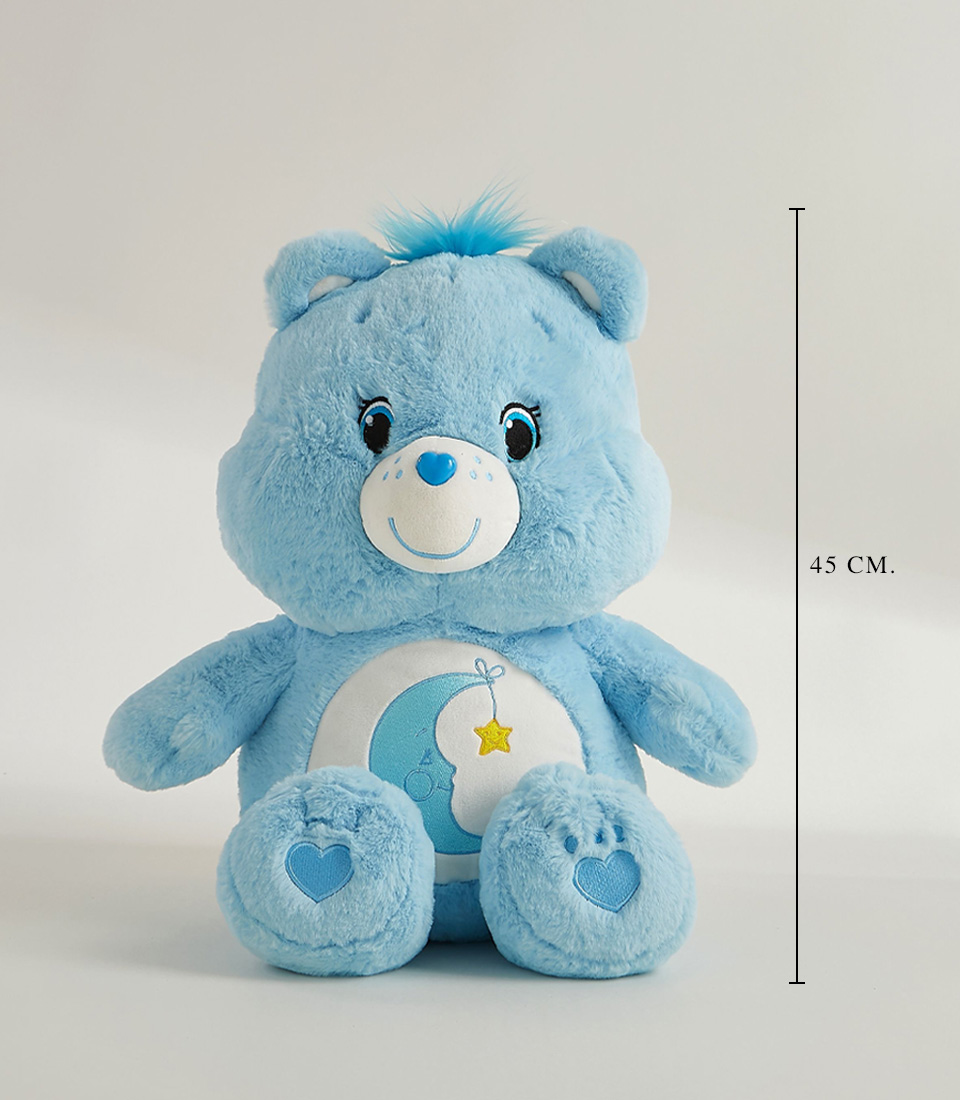 Soft blue plush bear with moon and star embroidery, perfect for snuggles and bedtime comfort.