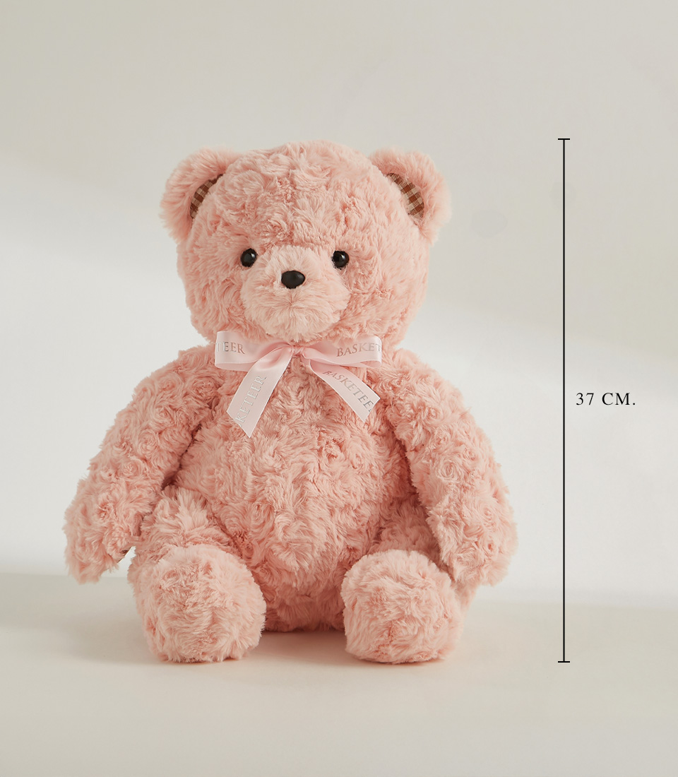 Soft pink plush teddy bear with a delicate pink ribbon, perfect for cuddling, gifting, and special occasions.