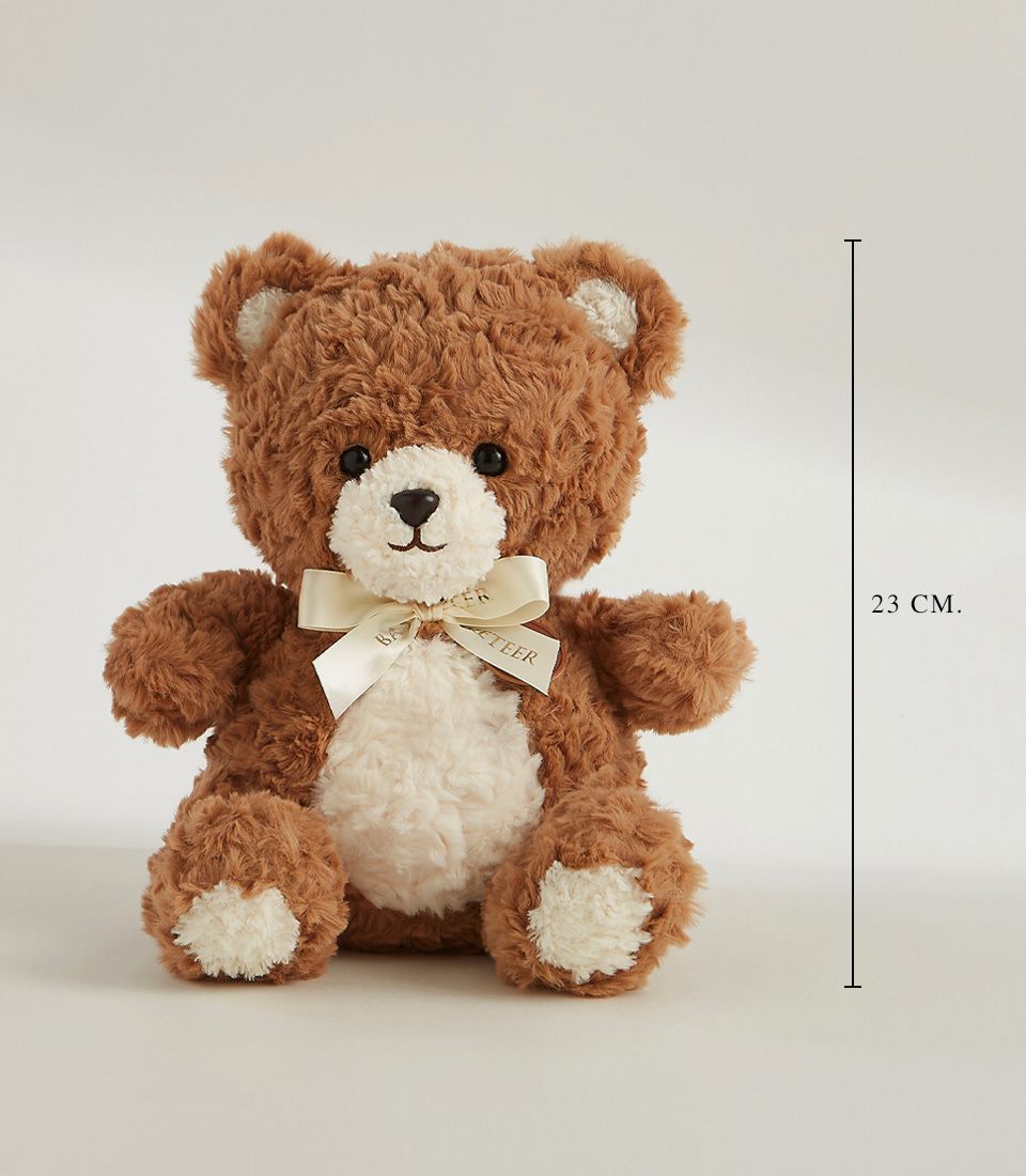 Soft brown plush teddy bear with a creamy white belly and a satin ribbon, perfect for cuddles and gifting.