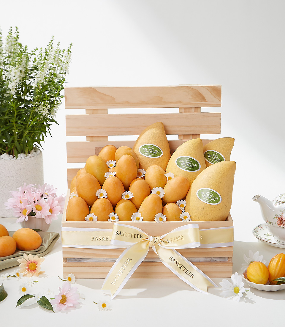 A luxurious fruit gift basket featuring 2 kg of Premium Mayongchid (Marian Plum) and Nam Dok Mai Mangoes, elegantly arranged in a wooden crate with white daisy flowers and a satin ribbon—a perfect gift for any special occasion.
