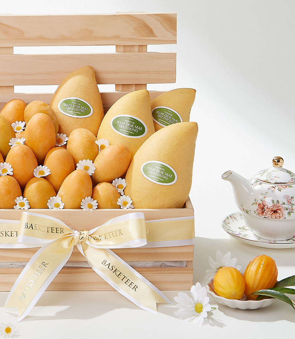 A luxurious fruit gift basket featuring 2 kg of Premium Mayongchid (Marian Plum) and Nam Dok Mai Mangoes, elegantly arranged in a wooden crate with white daisy flowers and a satin ribbon—a perfect gift for any special occasion.