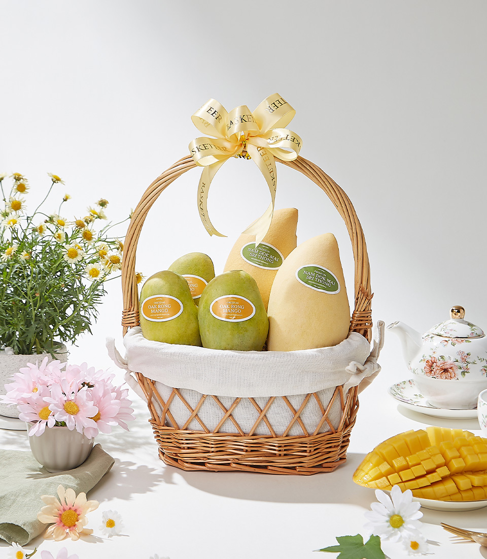 A premium wooden crate filled with handpicked golden Okrong mangoes, elegantly adorned with a satin ribbon, showcasing their rich aroma, creamy texture, and naturally sweet taste—a true indulgence for mango lovers.