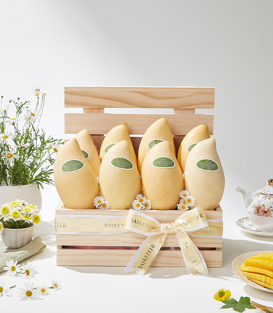 A beautifully presented wooden crate of Nam Dok Mai See Thong mangoes from Bang Khla Chachoengsao perfect for gifting and special occasions