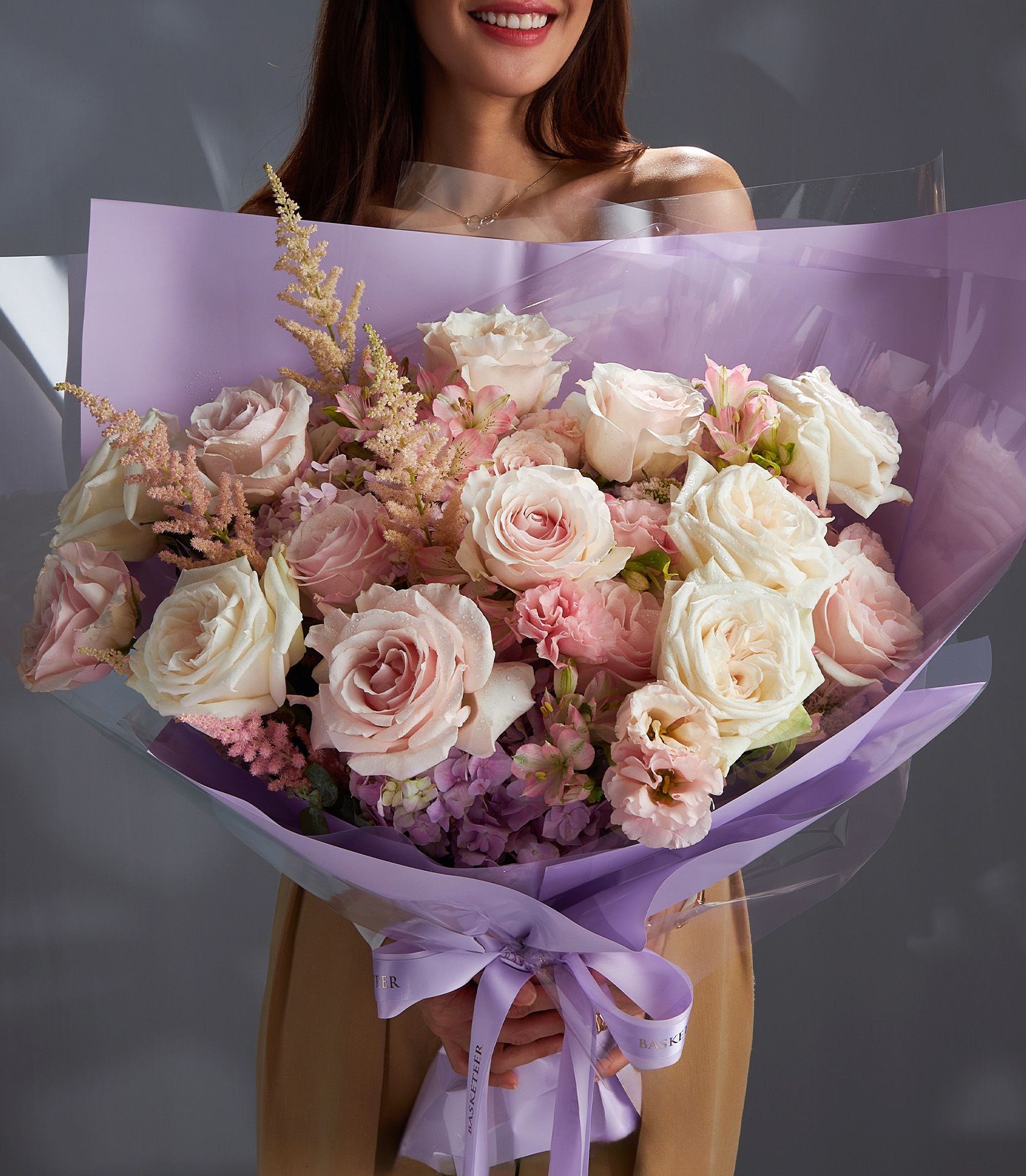 Bouquet with Plya Blance and Pink Cloud roses, purple hydrangeas, Majolica spray roses, lisianthus, astilbe, and alstroemeria