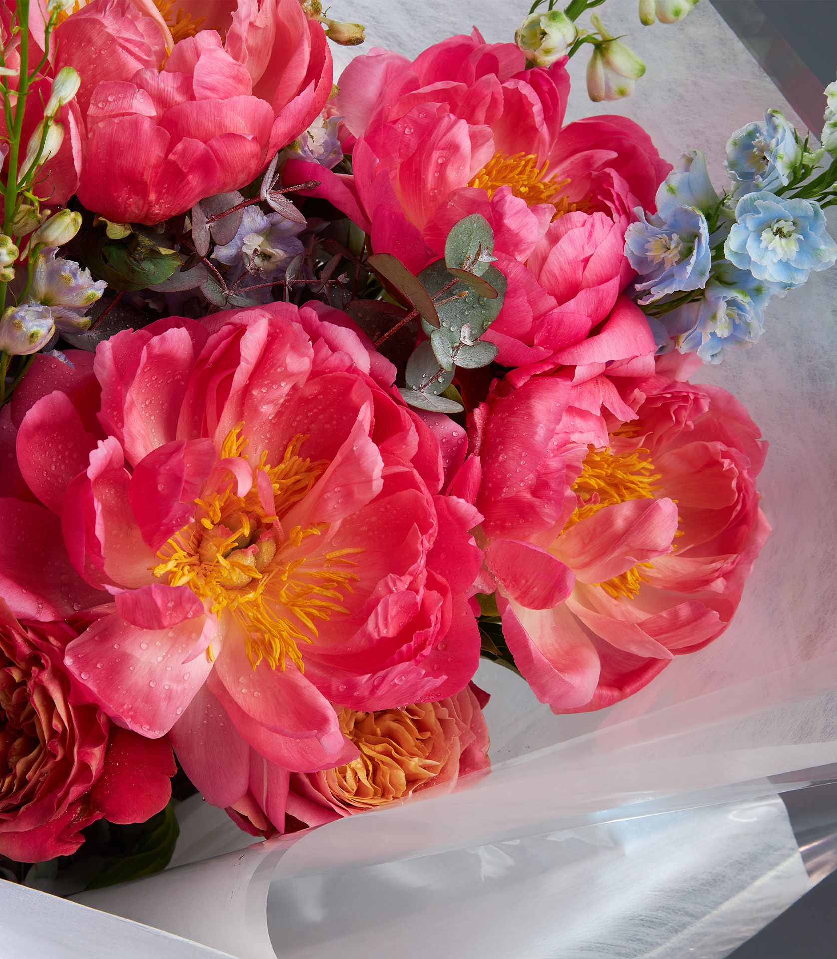 Luxury bouquet with pink peonies, Nubella roses, blue and purple delphinium