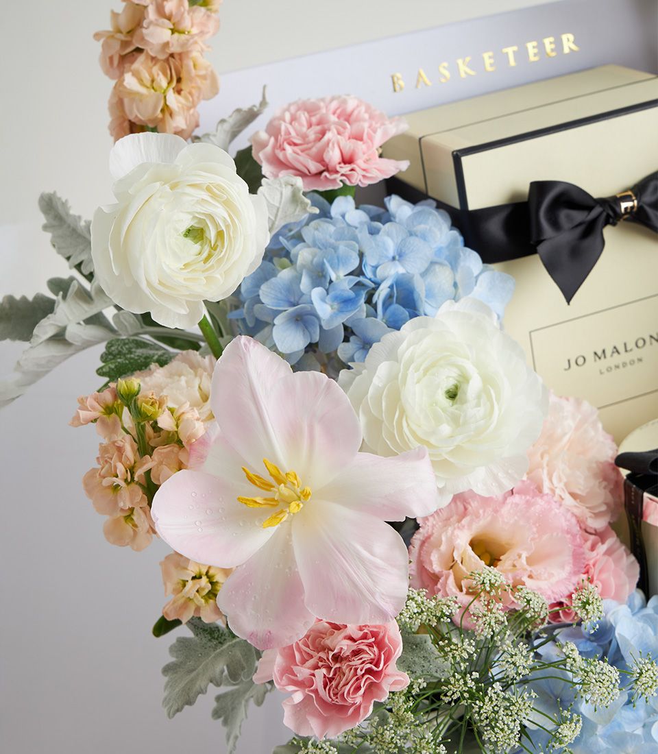 Jo Malone pastel flower arrangement with tulips, hydrangeas, carnations, and luxury gift box for Mother’s Day