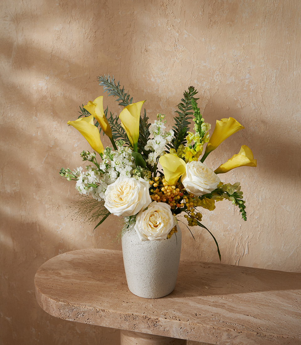 Luxury flower arrangement with pink roses and astilbe in a modern ceramic vase, perfect for romantic gifts and Bangkok flower delivery.