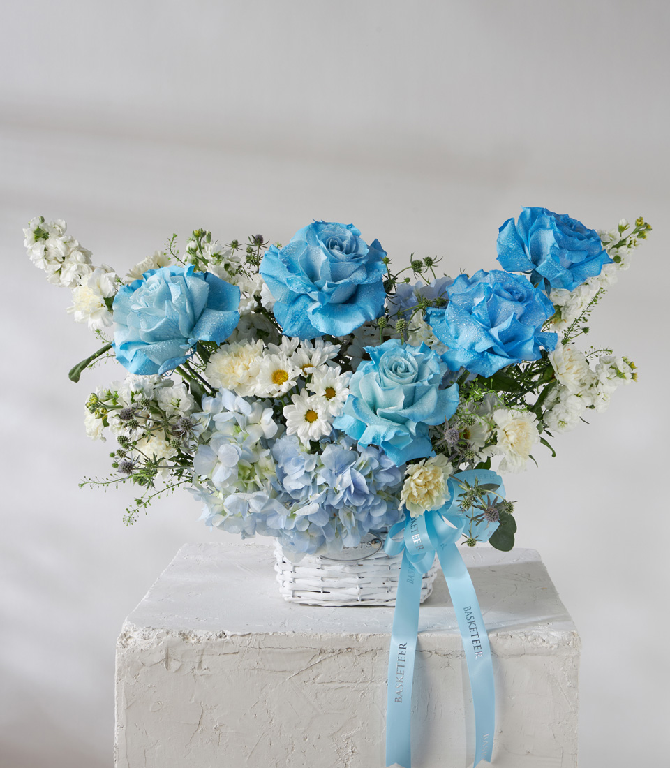Flower arrangement basket with blue roses white chrysanthemums and hydrangeas for premium delivery in Bangkok