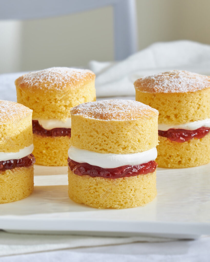 Close-up of mini Victoria sponge cakes with cream and strawberry jam at Charlotte Bakery Bangkok