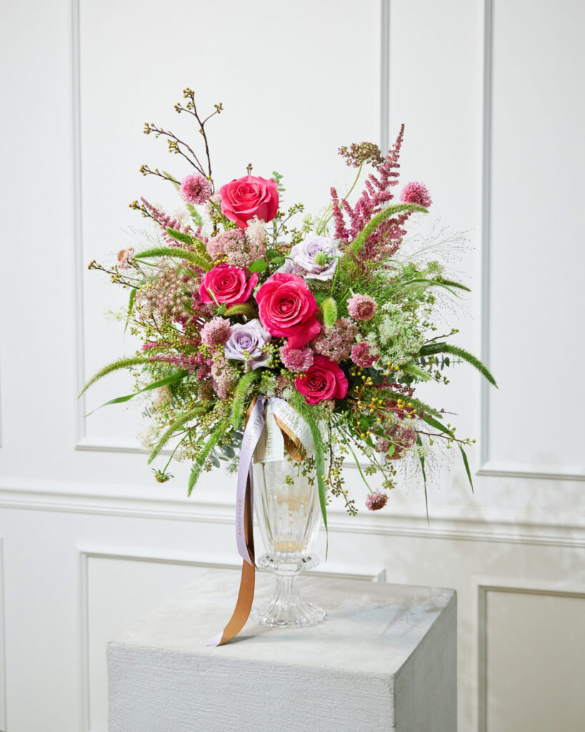 Elegant pink and lavender flower vase arrangement from Flowers by Basketeer