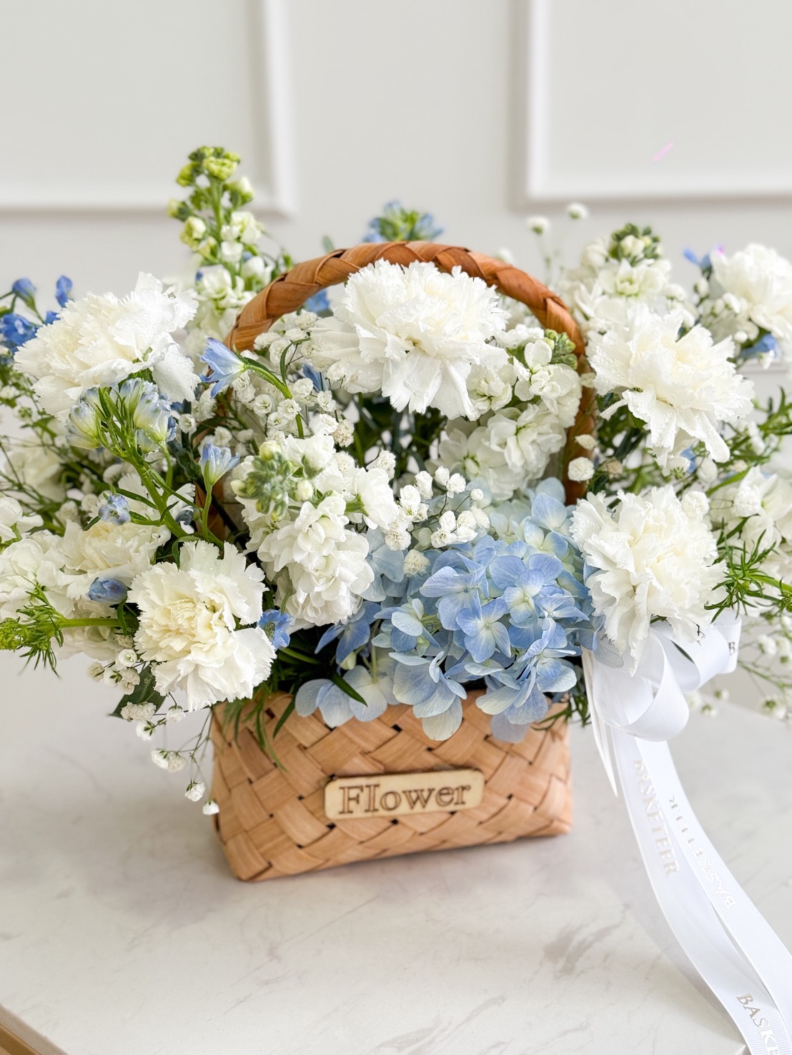 A woven basket labelled 