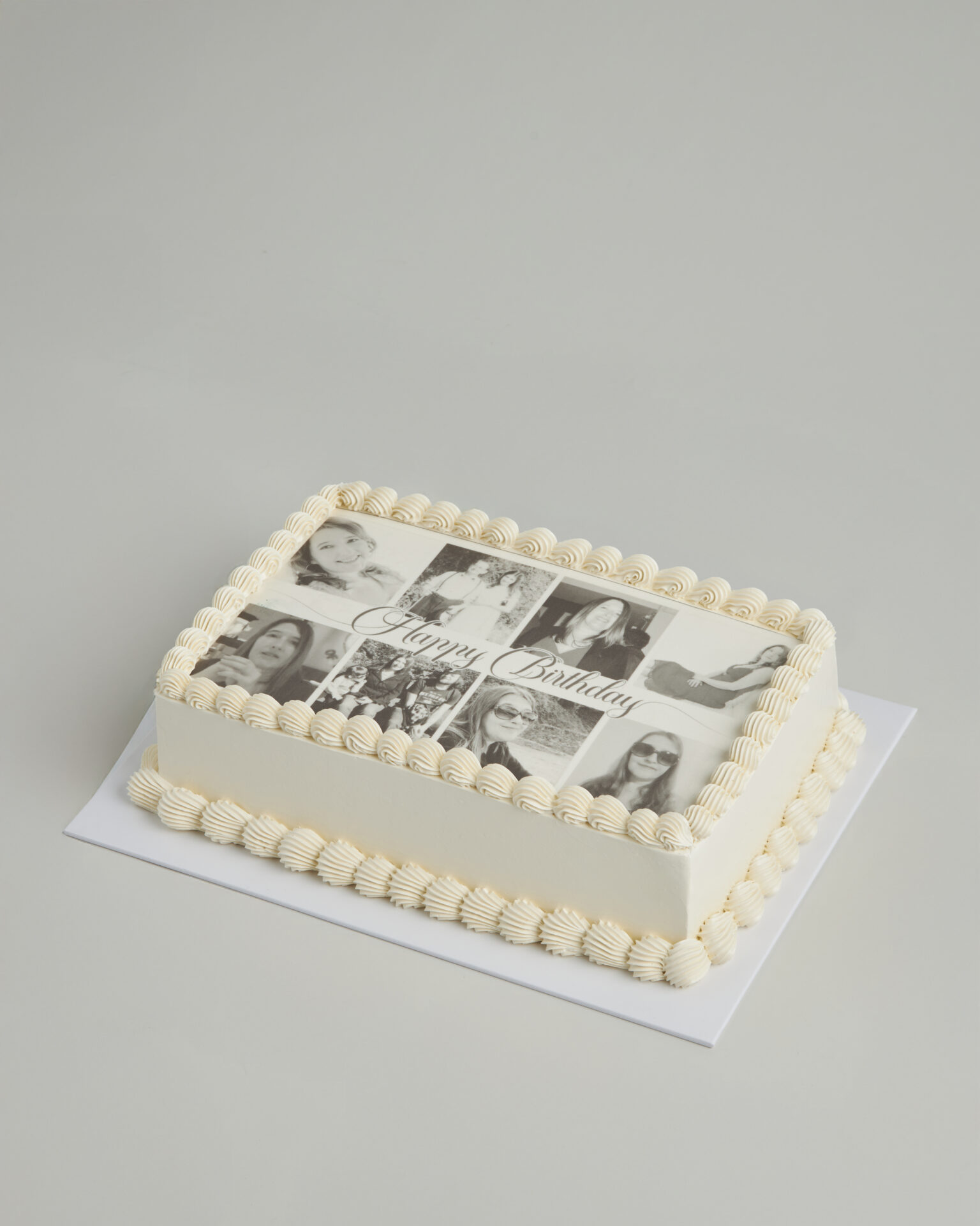 White birthday cake decorated with printed photo collage, Charlotte Bakery Bangkok
