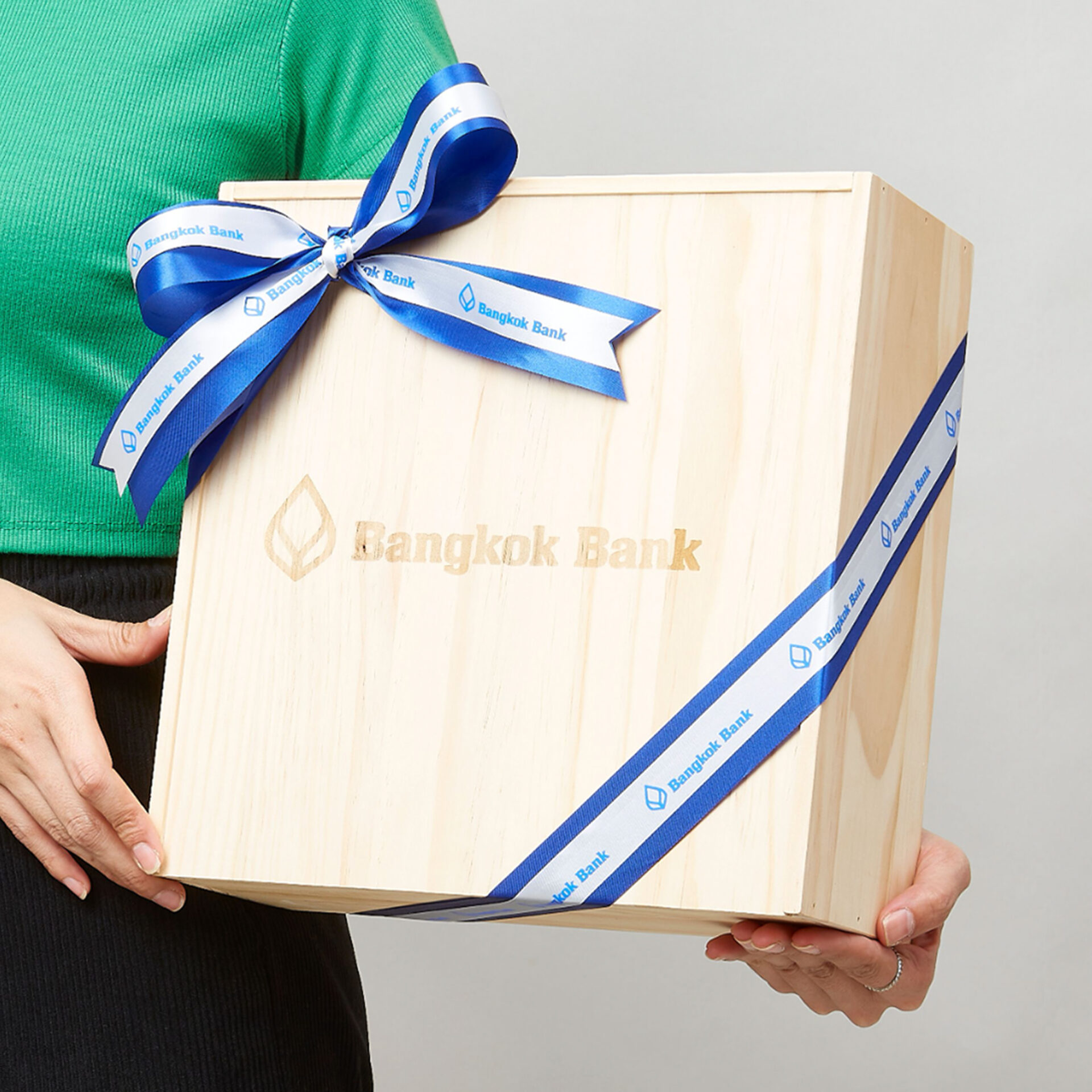 Corporate wooden gift box with blue Bangkok Bank ribbon by Basketeer Thailand
