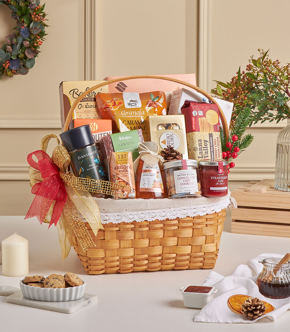 Luxury healthy gift basket with caramel almond granola, mixed nuts and gourmet snacks.