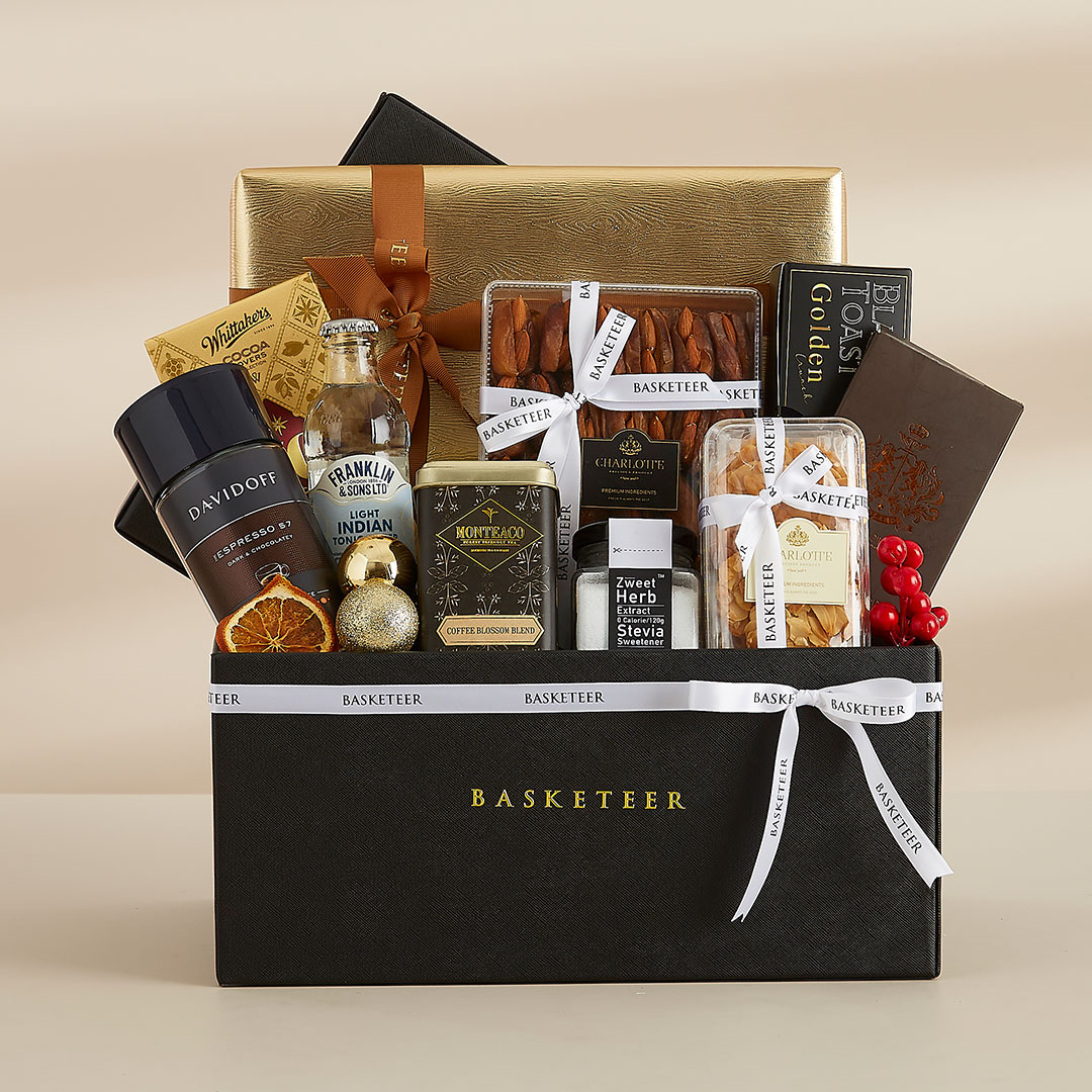 Luxury formal hamper by Basketeer featuring premium coffee, tonics, artisanal cookies, nuts, chocolate gift boxes, and elegant corporate-style packaging in a black and gold presentation — ideal for executives and corporate gifting in Bangkok, Thailand.