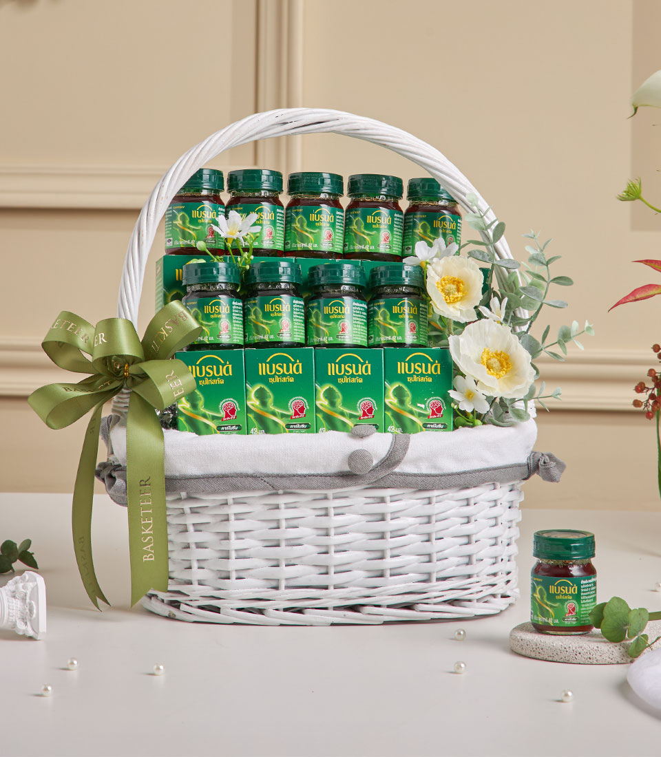 Premium bird’s nest wellness hamper in white wicker basket.
