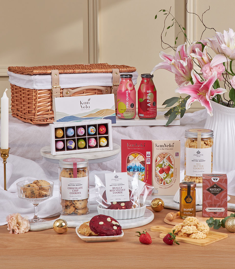 Gourmet festive gift basket with premium sweets and juices in wicker hamper Bangkok delivery