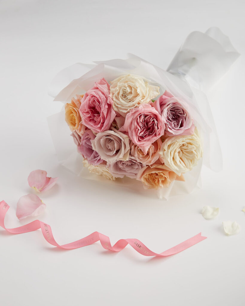 Pastel Valentine rose bouquet by Flowers by Basketeer featuring imported blush, pink, and cream roses — perfect for sending Valentine flowers to Bangkok.