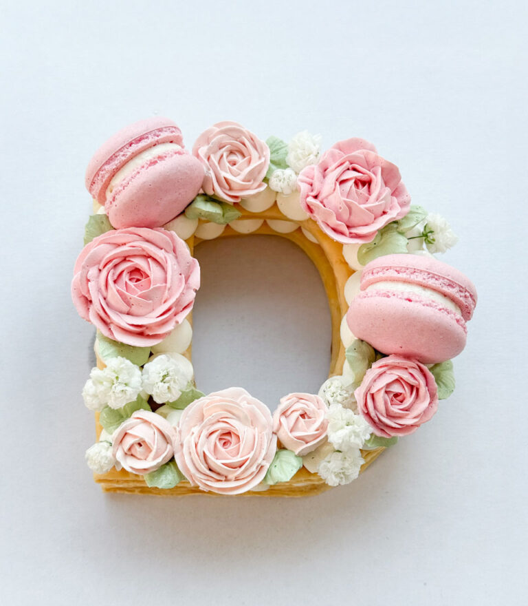 Handcrafted letter cake by Charlotte Bakery prepared in Bangkok.