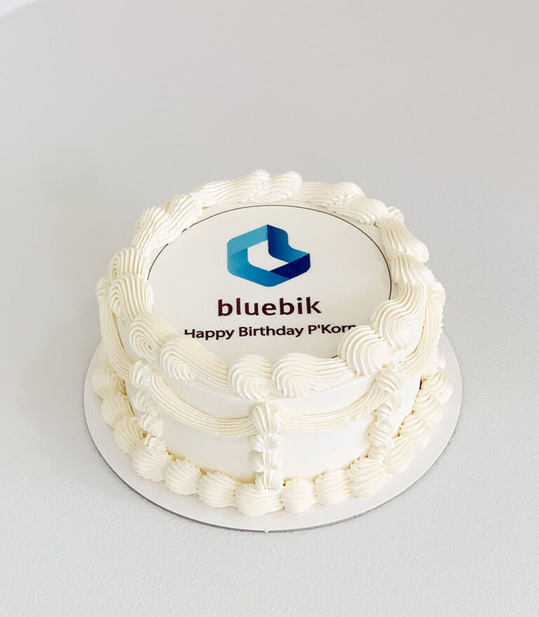 Colourful edible printing birthday cake with custom photo and floral buttercream by Charlotte Bakery in Bangkok