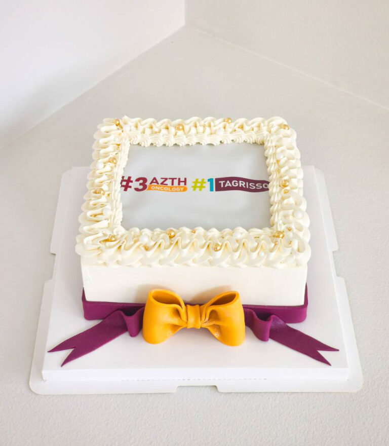 Edible printing birthday cake with custom illustration and gold butterfly accents by Charlotte Bakery in Bangkok