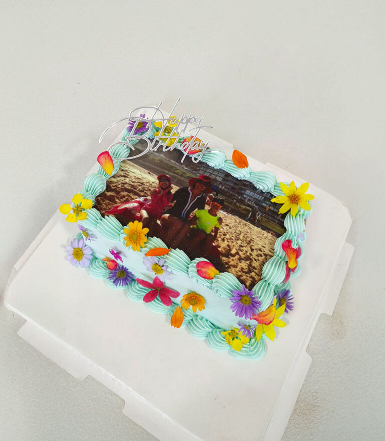 Pastel edible printing cake with custom photo and floral buttercream details by Charlotte Bakery in Bangkok