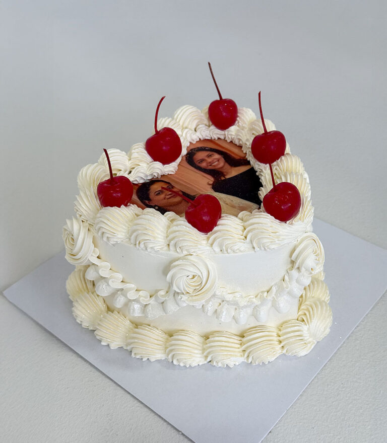 Edible printing cake with custom photo, whipped cream piping, and cherry topping by Charlotte Bakery in Bangkok