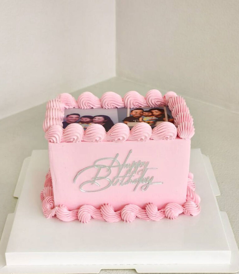Pink edible printing birthday cake with custom photo prints and classic buttercream piping by Charlotte Bakery in Bangkok