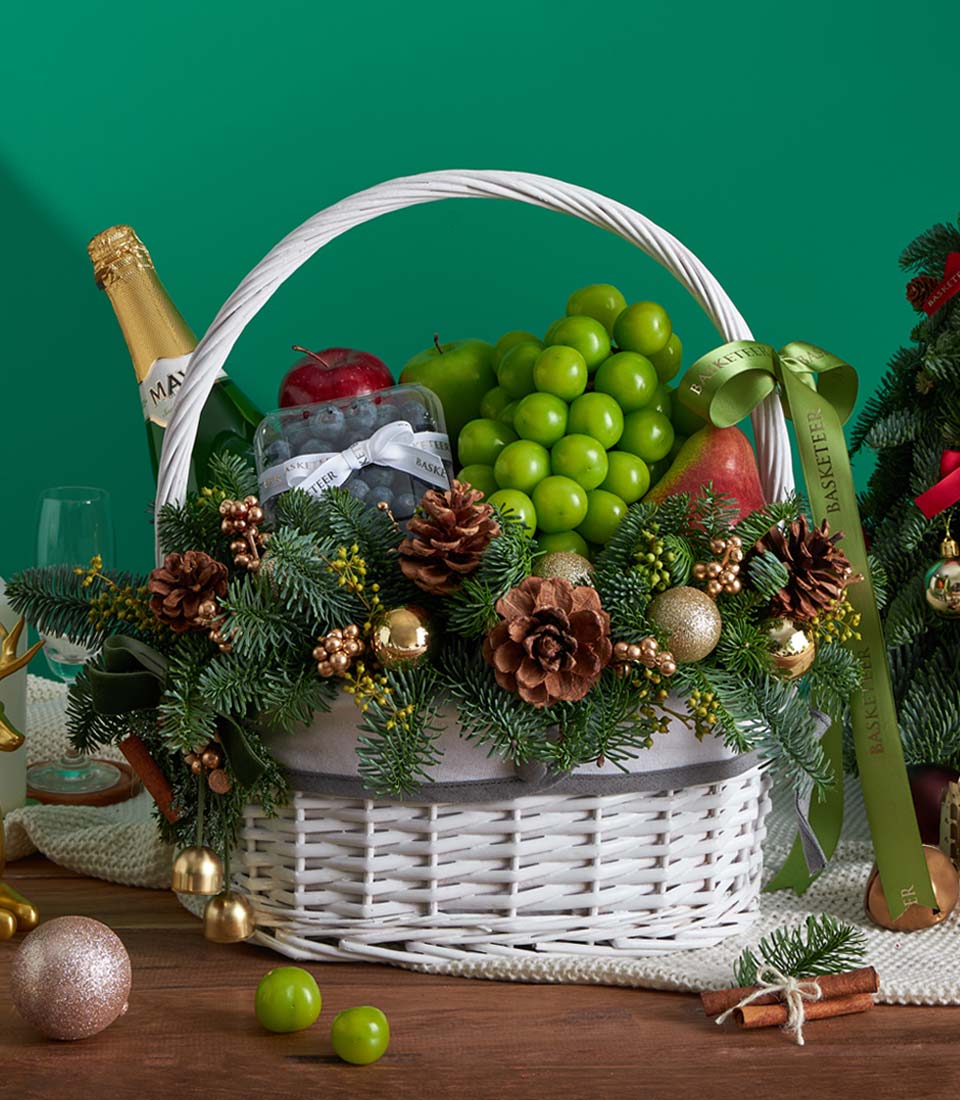 luxury Christmas fruit basket with champagne