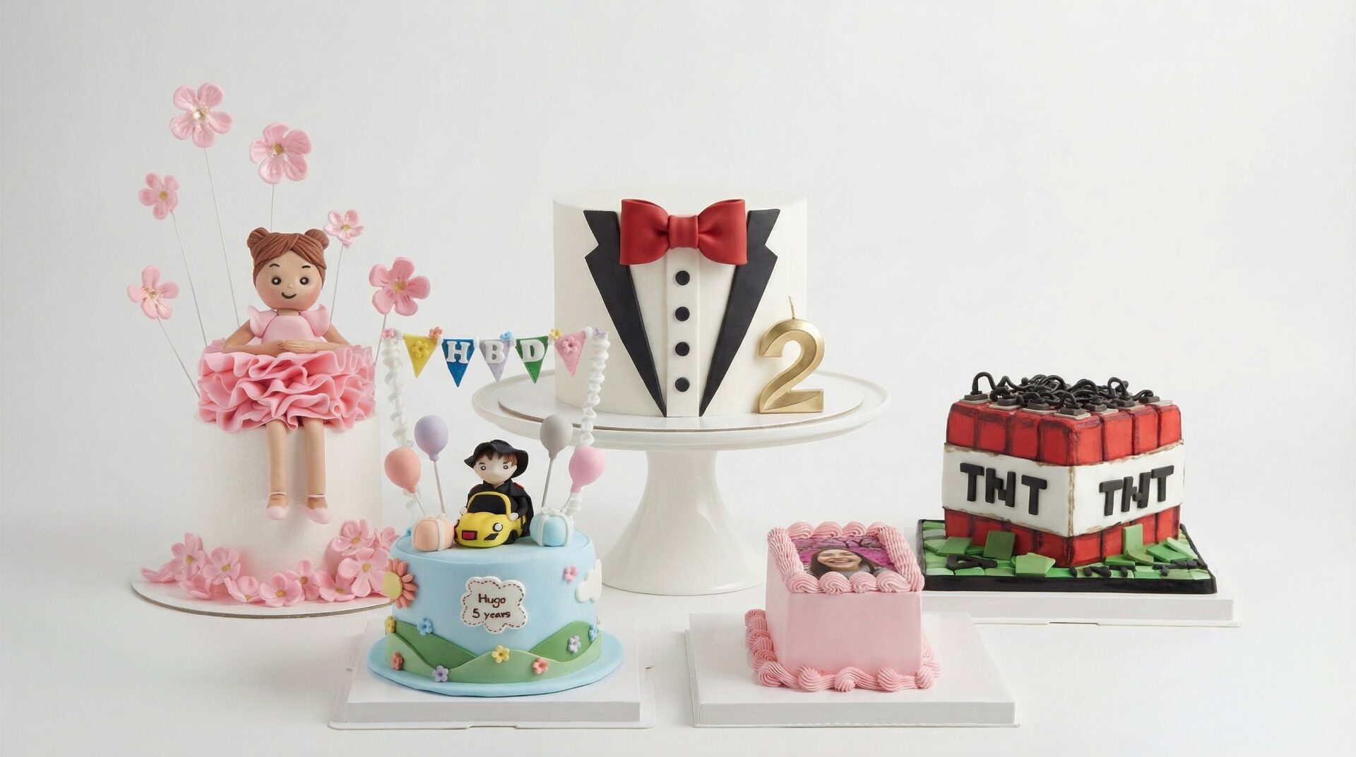A collection of custom birthday cakes featuring fondant figures, 3D designs, and personalised details by Charlotte Bakery in Bangkok