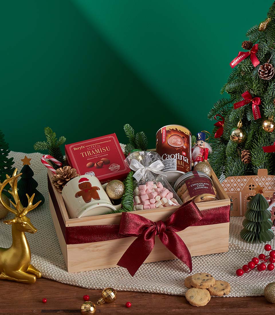 Luxury Christmas dessert gift box with hot chocolate.
